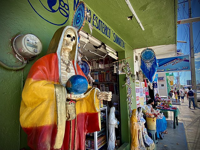The image of Santa Muerte can be connected to Aztec Death Reverence and European plague imagery, but contemporary ritual practices surrounding Santa Muerte are more readily attributed to Afro-Caribbean Animism and spirit worship.